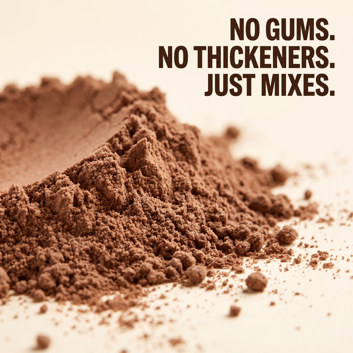 Close up of Island Power Protein chocolate powder showing its fine texture, made with no gums or thickeners